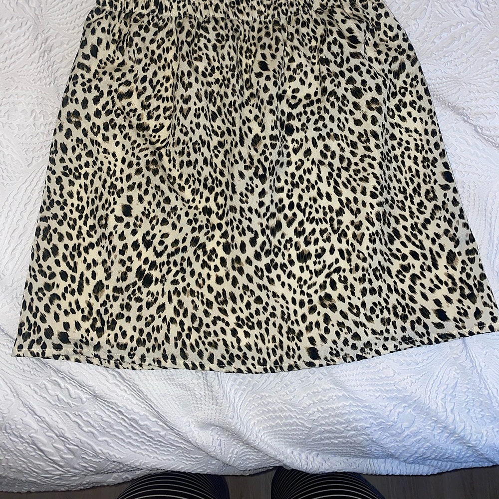 Super cute Cheetah print skirt. NWT. Size small.